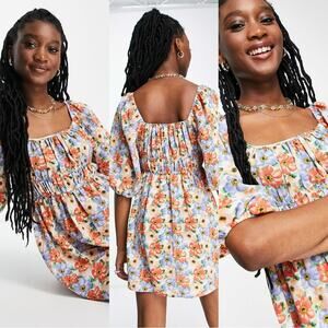 ASOS DESIGN ruched bust mini skater dress with puff sleeve in bold floral print